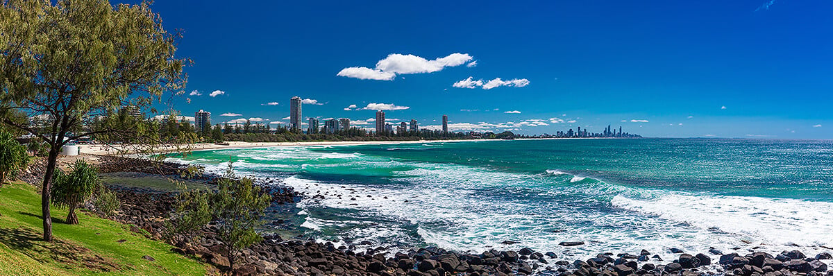 View of Surfers Paradise in background with beach and closer buildings in foreground
