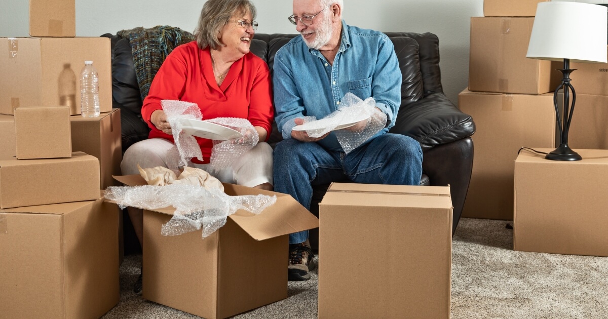 Older couple downsizing while moving