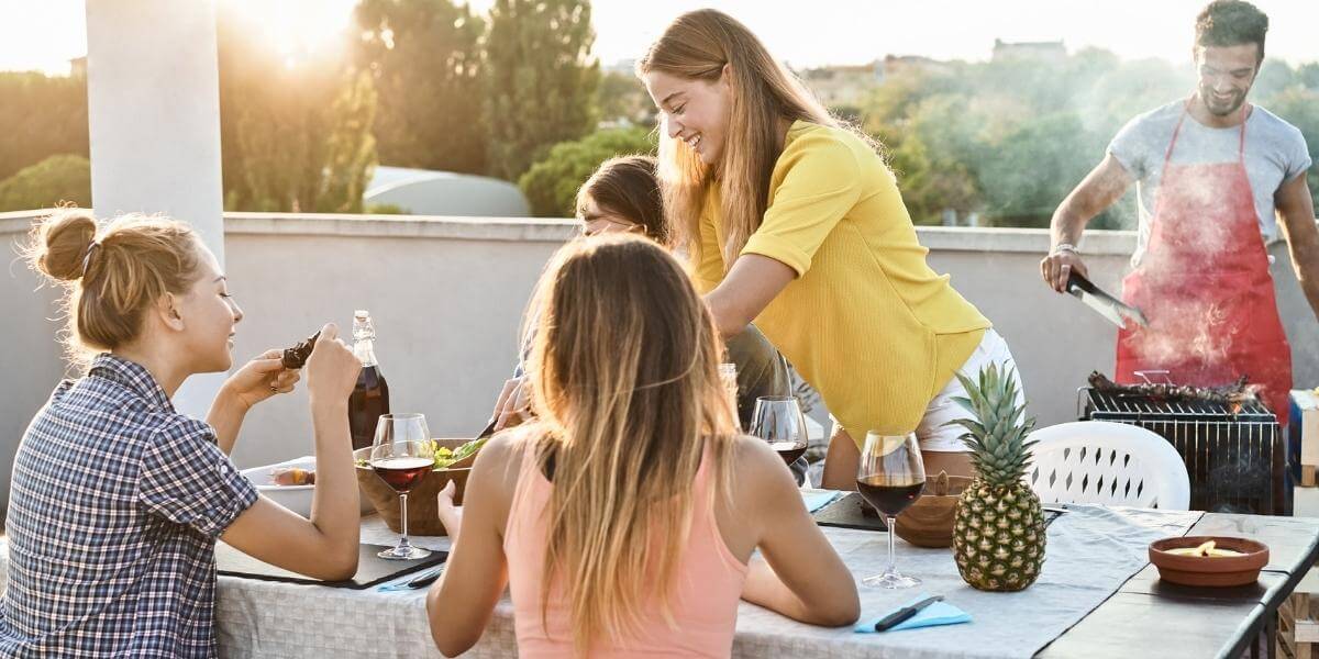 happy family having dinner outside in Brisbane