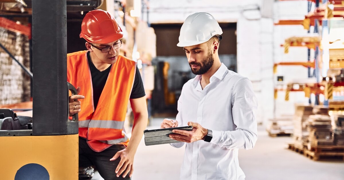 two interstate storage staff consulting checklist in a warehouse