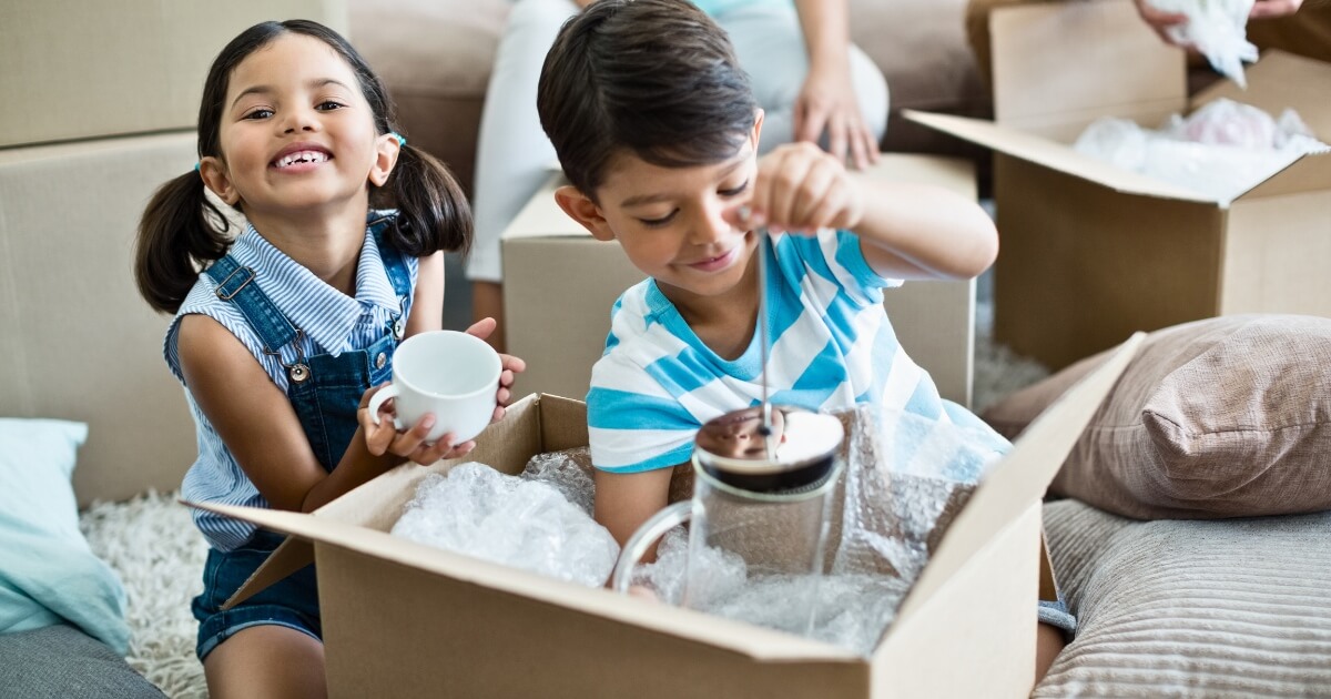 Kids unpacking when moving house with kids