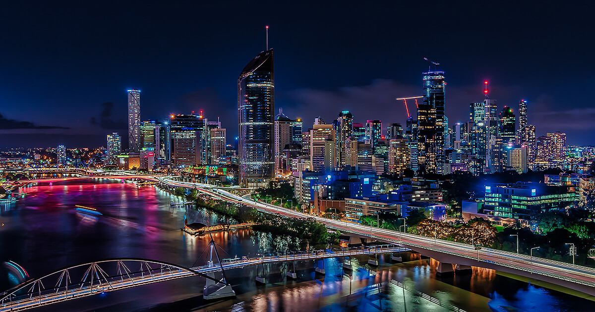 Brisbane city skyline at night with coloured lights