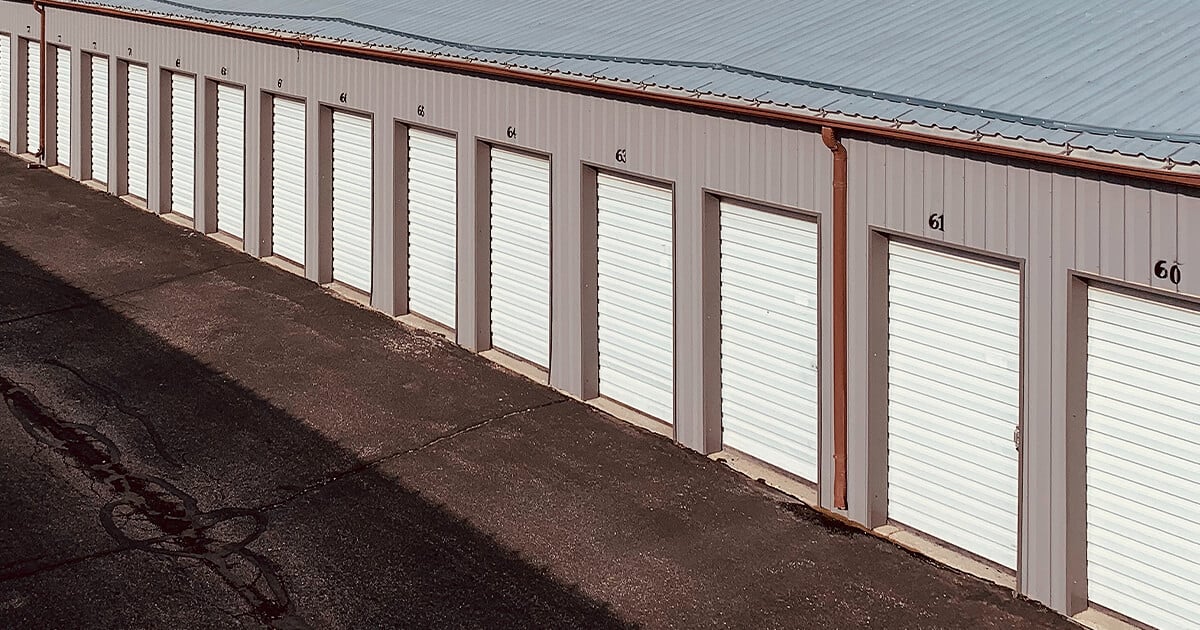 Row of self storage units in building late in afternoon