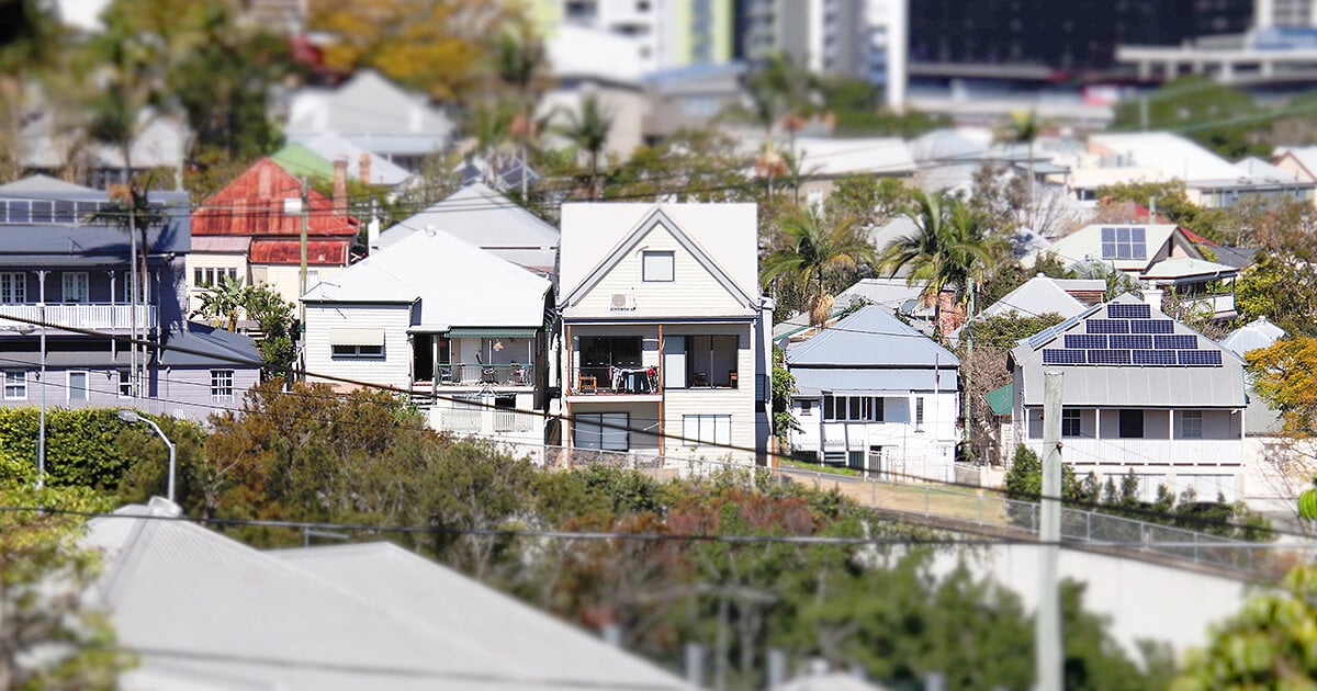 Row of Queensland houses in focus with background and foreground out of focus