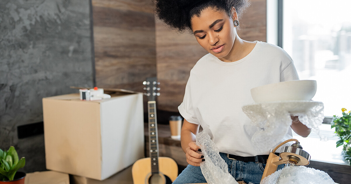 Women packing for a move