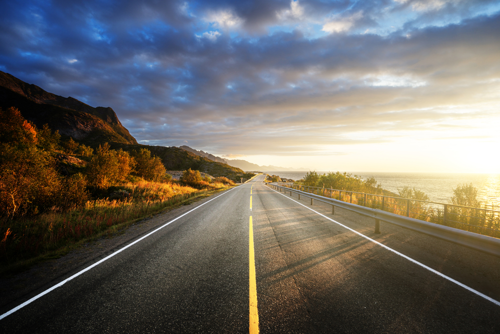 road by the sea in sunrise time,  Lofoten island, Norway