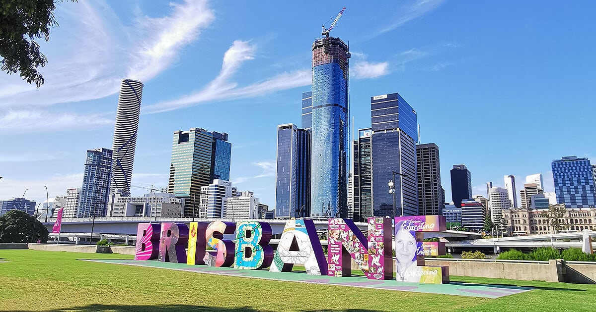 Brisbane lettering signage in front of Brisbane skyline