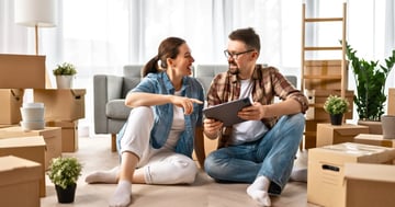 Happy couple moving house