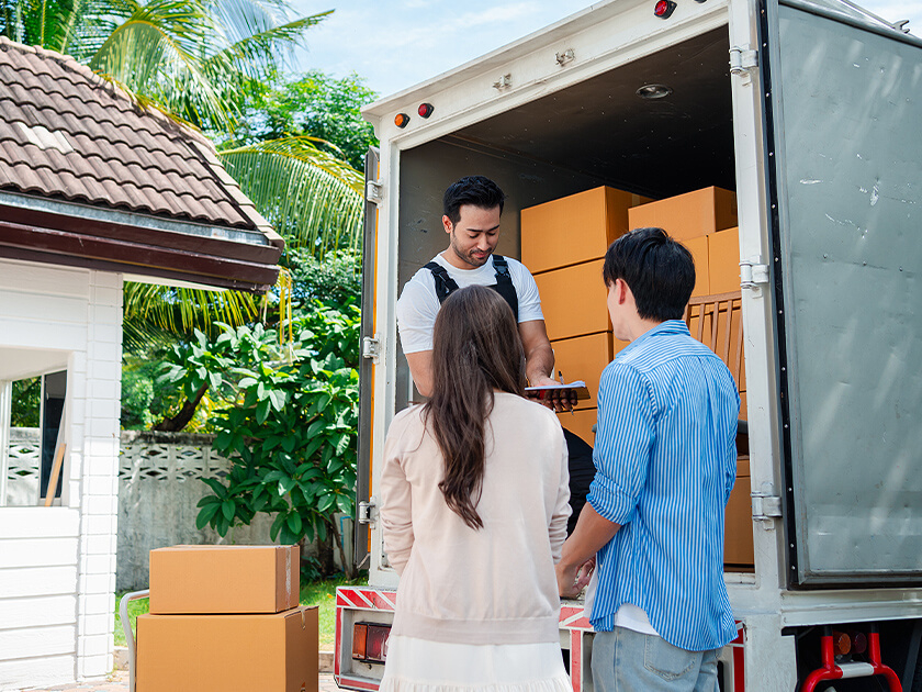 Moving truck wtih couple