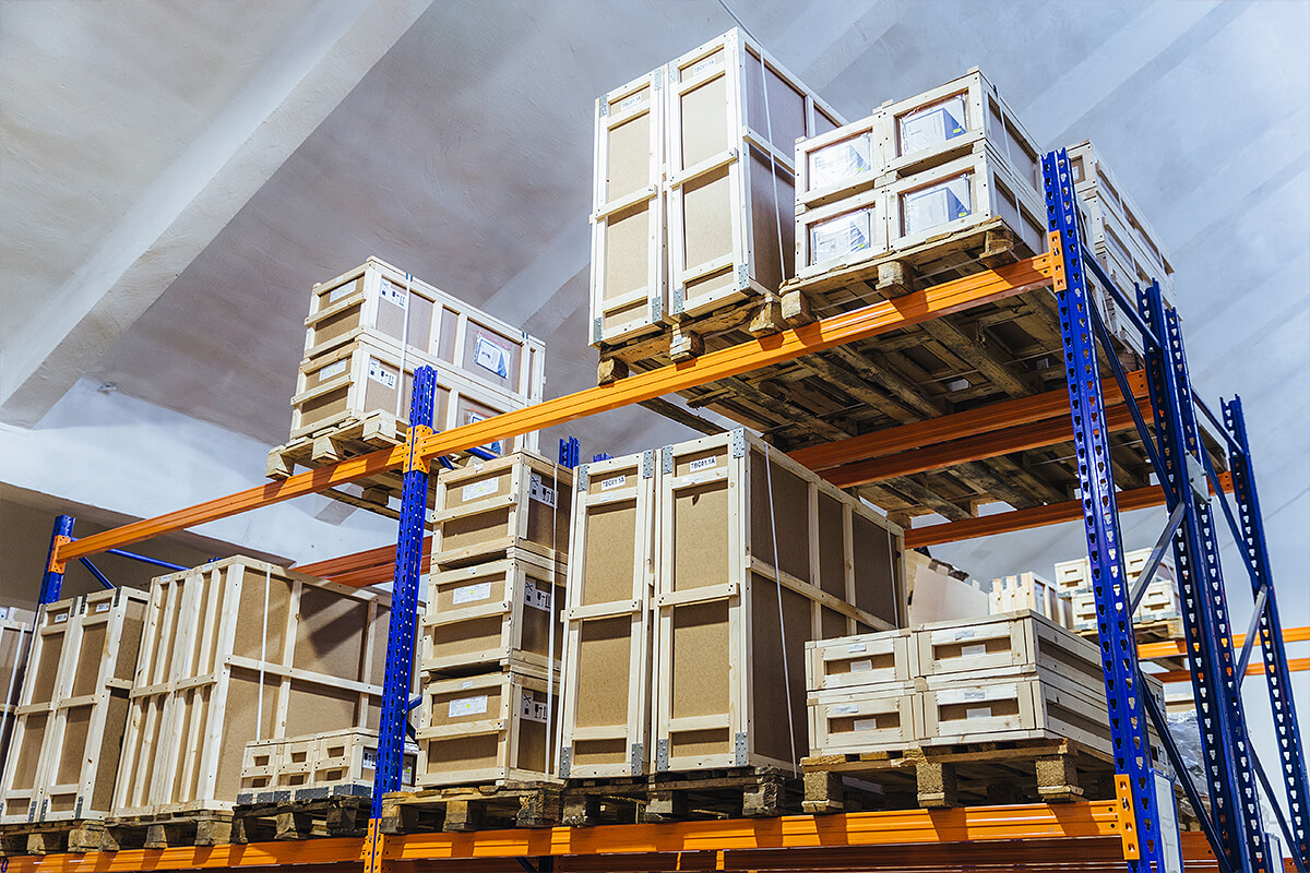 Large storage crates stacked in warehouse